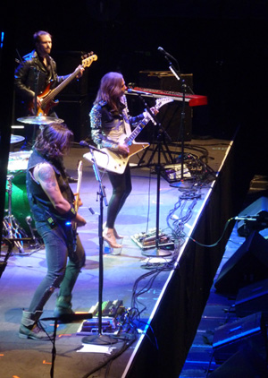 Halestorm on stage at Wembley Arena October 2013