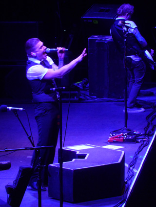 Shinedown's Brent Smith on stage at Wembley Arena October 2013