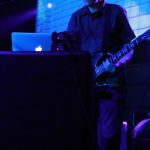 Justin Broadrick from Jesu with his laptop on stage at Beyond The Redshift Festival, London, May 2014