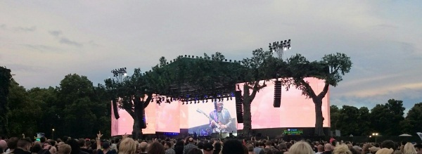 Black Sabbath performing at the British Summer Time festival in Hyde Park with Tony Iommi on the big screens.