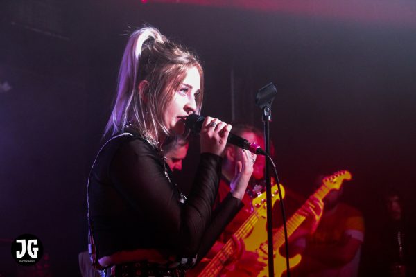 As Everything Unfolds - frontwoman Charlie Rolfe live on stage, London February 2022