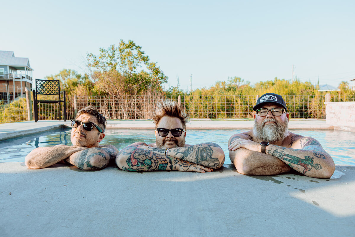 Bowling For Soup September 2025 Promo Photo - Pool by Amy Russell